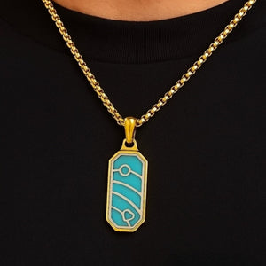 T.M.J Aqua Crest turquoise pendant necklace on 18K gold-plated stainless steel chain, showcasing vibrant turquoise gemstone and elegant design.