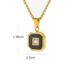 Aurex Onyx and princess-cut CZ pendant by T.M.J, stainless steel with PVD plating, showcasing a sleek, elegant jewelry design.
