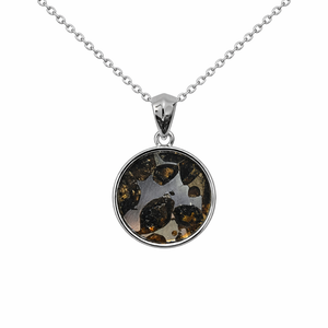 Sterling silver pendant with pallasite meteorite and green olivine crystal inclusions, crafted by T.M.J.
