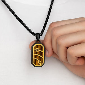 Yellow tiger eye pendant necklace with black PVD plated stainless steel chain, featuring a sleek and polished pendant from T.M.J.