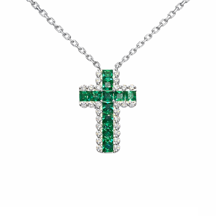 Green sterling silver cross necklace by T.M.J, religious jewelry with a detailed cross pendant on a chain.