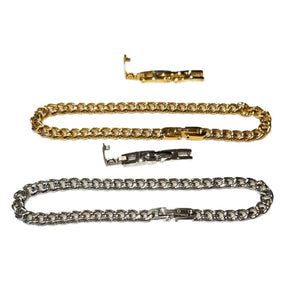 Stainless steel and gold-plated curb link bracelet by T.M.J, 5mm width, featuring polished gold accents on stainless steel links.