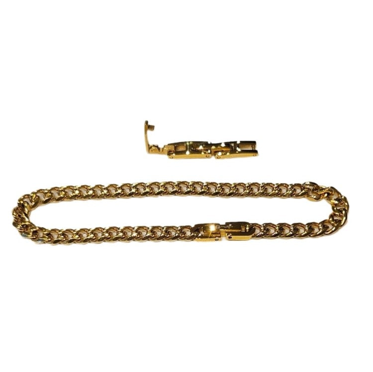 Stainless steel and gold-plated curb link bracelet by T.M.J, 5mm width, 19.5cm length, showcasing shiny metallic finish.