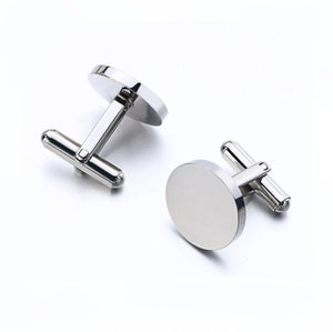 Elegant round stainless steel cufflinks with engravable surface, crafted by T.M.J, featuring a sleek polished finish.
