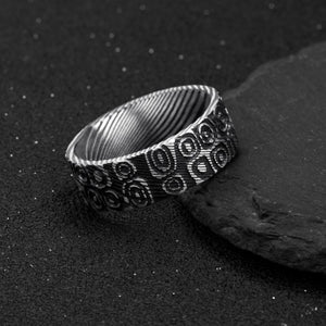 T.M.J stainless steel Aegis men's Damascus ring with oval and circle design symbolizing cycles, protection, and unity