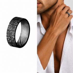 T.M.J stainless steel men's Damascus ring with oval and circle designs symbolizing cycles, protection, and unity.