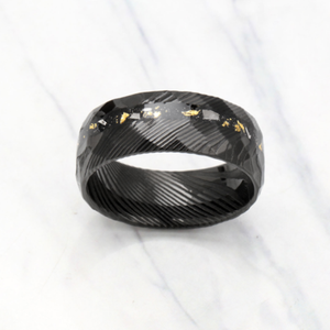 Erebus men's stainless steel ring with meteorite and gold Damascus steel accents, featuring intricate textured design.