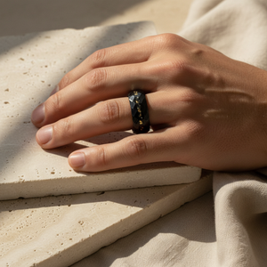 Men's Erebus stainless steel ring with meteorite and gold Damascus steel design by T.M.J, featuring intricate patterns and polished finish.
