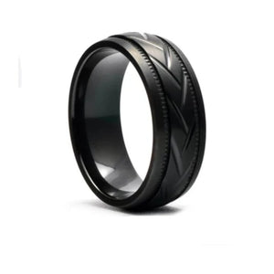 Black zirconium patterned stainless steel men's ring with intricate design, crafted by T.M.J.
