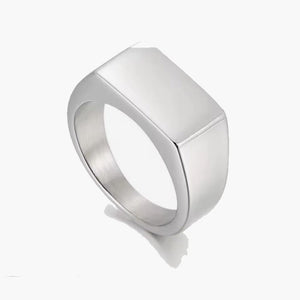 Men’s polished silver 316L stainless steel dress ring by T.M.J, featuring a sleek, shiny finish and modern design.