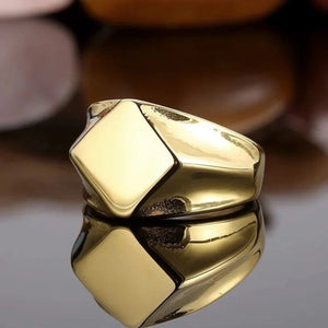 Men’s stainless steel square face ring in polished silver or gold, featuring a bold modern silhouette and sleek design.
