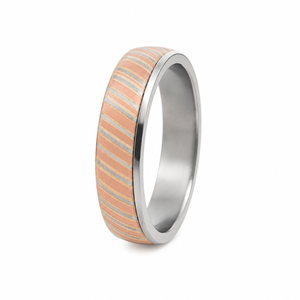 T.M.J The Tsuchi Band 6mm Damascus stainless steel ring, showcasing its unique layered pattern.
