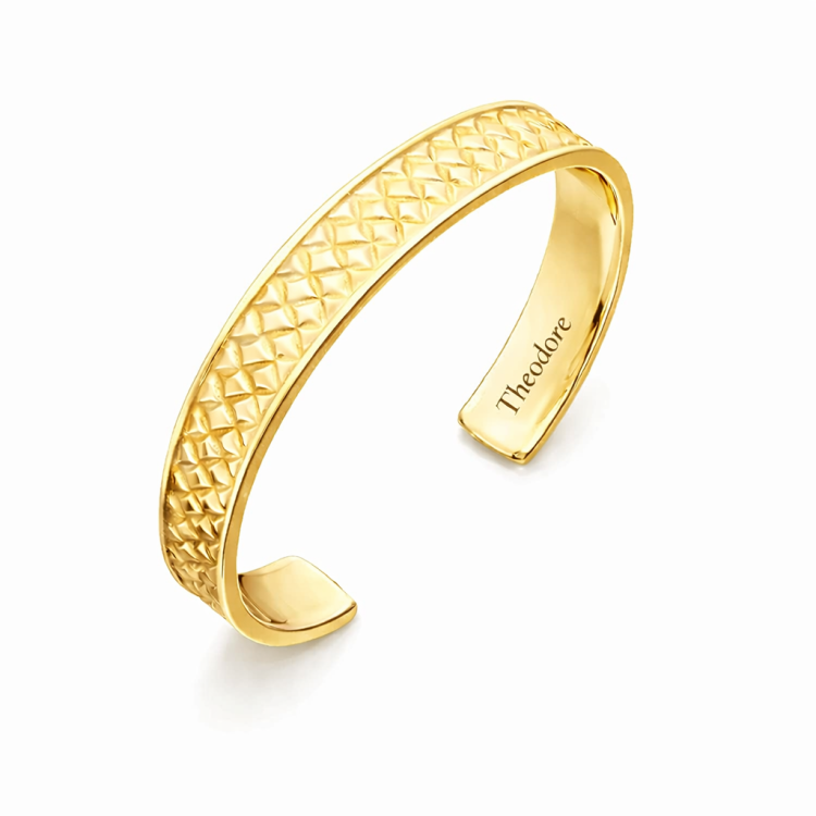 Sterling silver woven pattern cuff bangle from T.M.J, featuring a textured, handcrafted design in a sleek bracelet style.