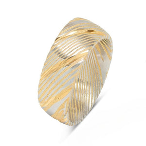 Gold Cerakote Damascus stainless steel ring by T.M.J, polished finish, shown in size M/6.5.