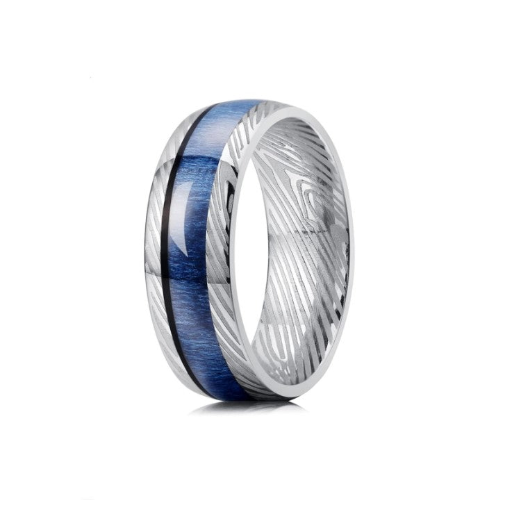 Men’s Damascus steel titanium ring with 8mm blue hard wood inlay, crafted by T.M.J, showcasing detailed design and modern style.