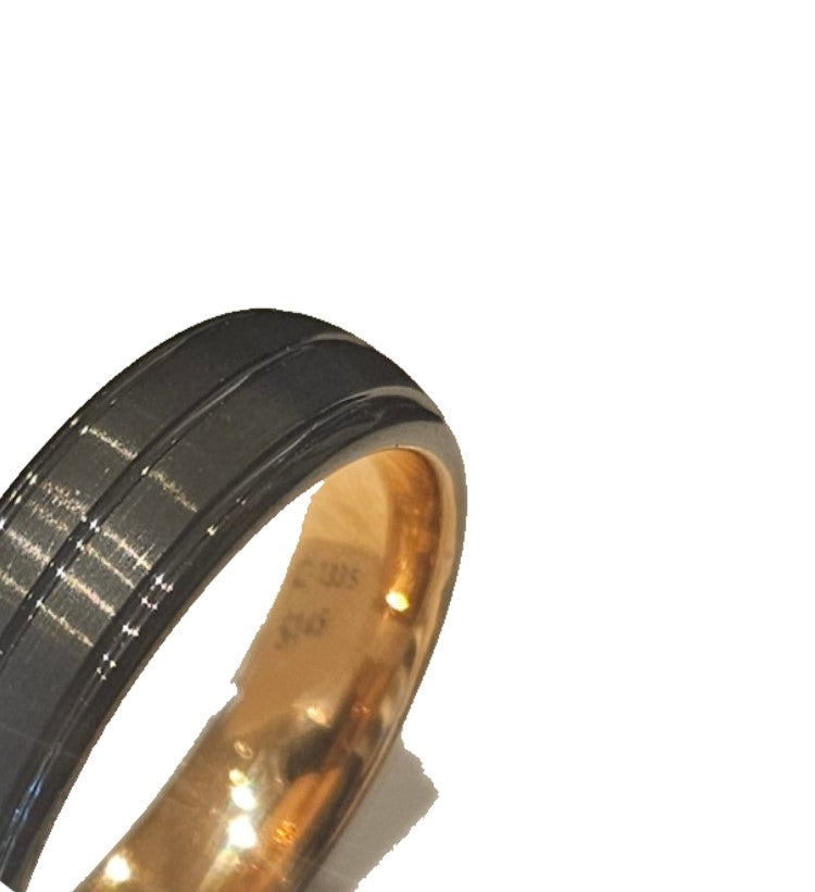 T.M.J tungsten carbide and rose gold ring displaying a sleek, polished band with a modern design and smooth finish.