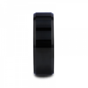 T.M.J "The Abyss" tungsten carbide ring with a sleek, dark finish and minimalist design, showcasing its smooth band and modern style.