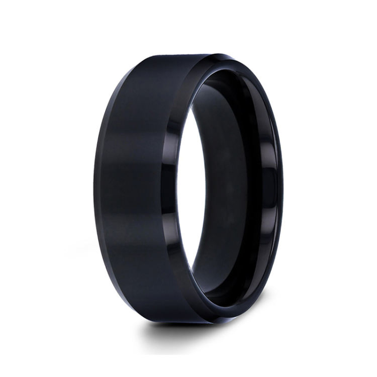 T.M.J Tungsten Rings The Abyss tungsten carbide ring with a sleek, dark finish and smooth band design.