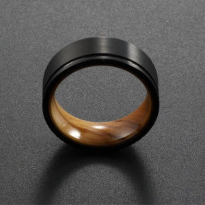 Black tungsten ring with satin finish and whiskey oak barrel design, 8mm width, by T.M.J. The Winner collection.