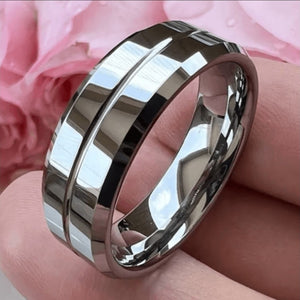 T.M.J tungsten carbide edge ring, durable and polished tungsten rings with a sleek, shiny finish for stylish wear.