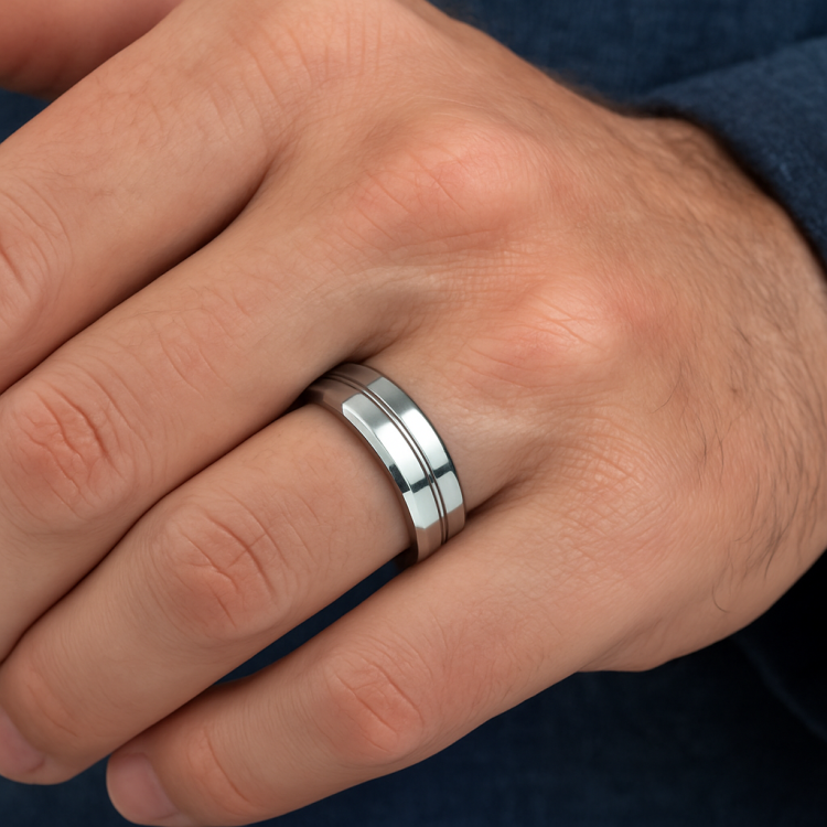 T.M.J tungsten carbide edge ring showing a sleek, polished silver band with beveled edges, designed for durability and style.