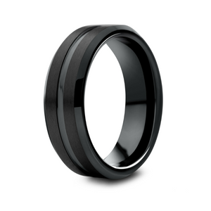 Black zirconium patterned men's ring by T.M.J, showcasing a sleek design with intricate pattern detail in close-up view.