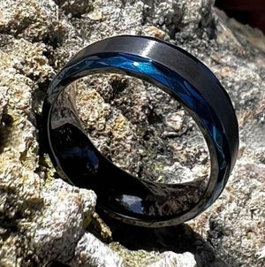 Black zirconium and blue beveled edge 8mm zirconium ring by T.M.J, showcasing sleek design and modern craftsmanship.
