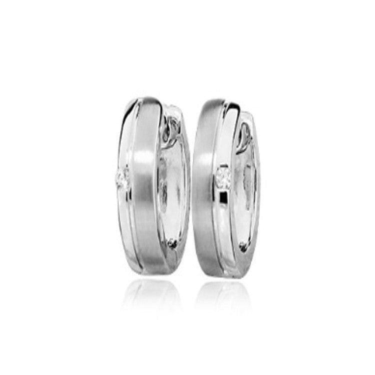 Sterling silver TMJ Aetherion Huggie earrings with black CZ stones, rhodium finish, and satin polish for a sleek, modern look.