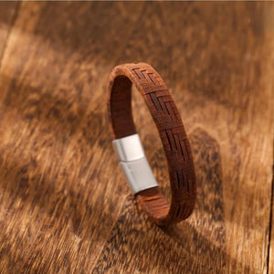 Brown genuine leather bracelet with a stainless steel clasp, premium braided design, by TMJ.