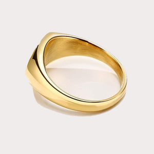 Stainless steel TMJ classic oval signet pinky ring, silver-tone with smooth polished finish, displayed on a white background.
