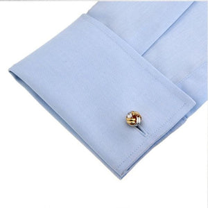 T.M.J plain metal twist knot cufflinks for men on light blue dress shirt cuff