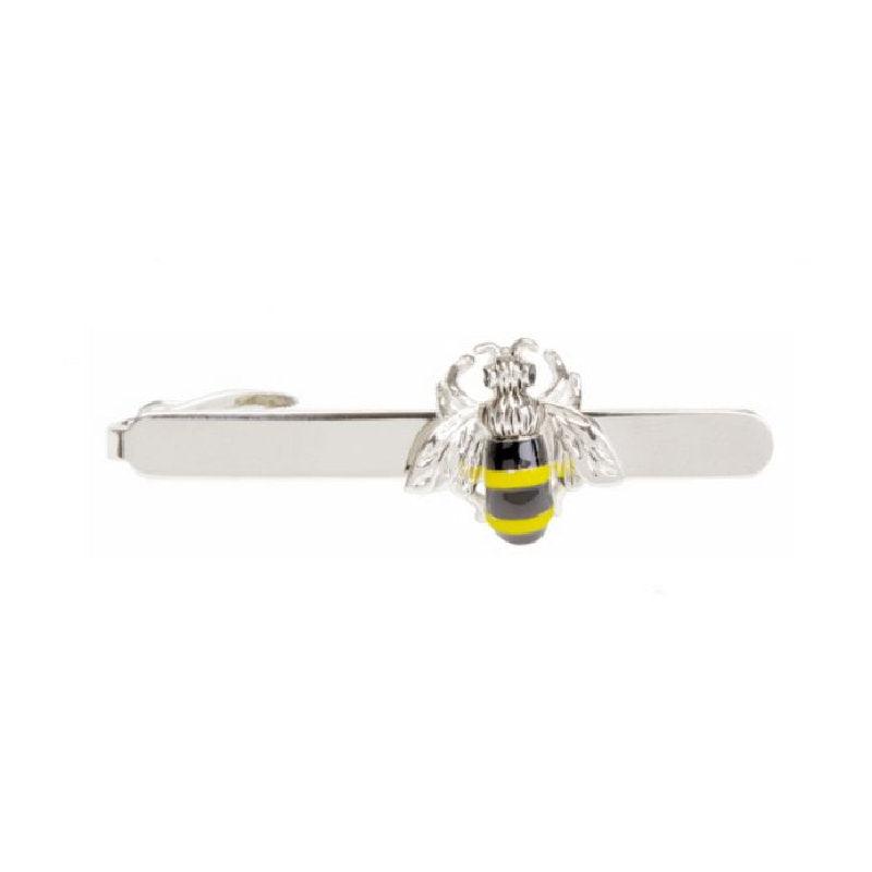 Dalaco Gold and Silver Enamel Bee Tie ClipIntroducing our Gold and Silver Enamel Bee Tie Clip, a meticulously crafted accessory that adds a touch of elegance and charm to any attire.
Key Features:
Design: Tie BarsDalacoTheodore Men's JewelryGold and Silver Enamel Bee Tie Clip