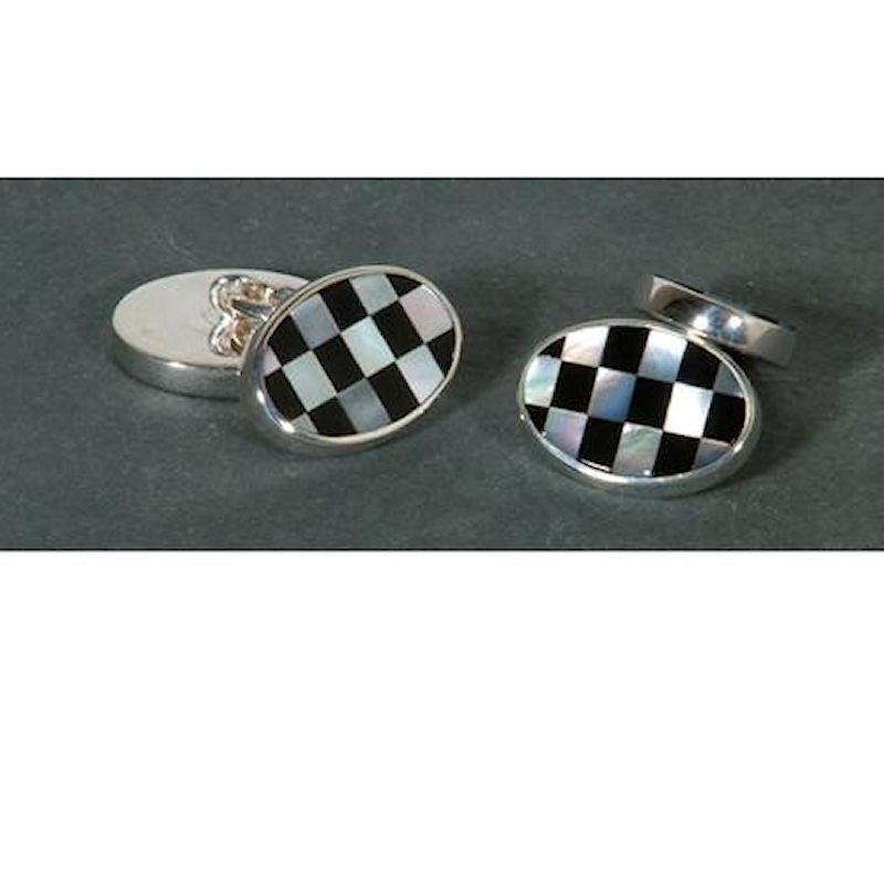 Dalaco sterling silver cufflinks with mother of pearl and onyx inlays, showcasing elegant and polished men's jewelry accessories.