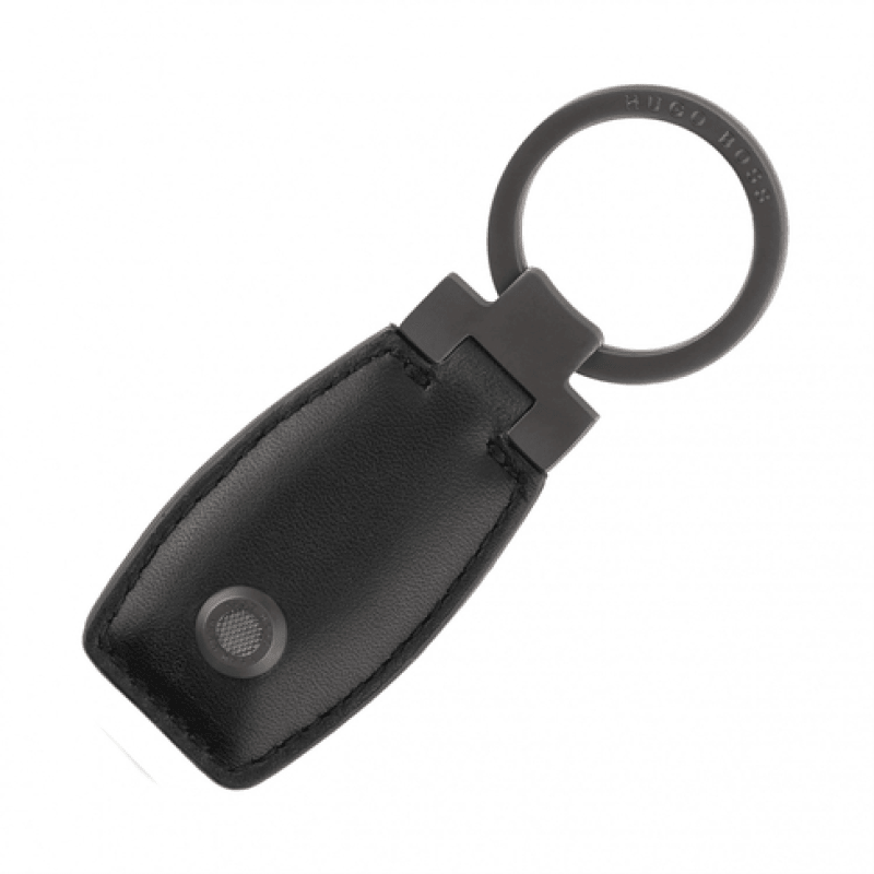 HUGO BOSS Executive pen with gun metal grey stainless steel body and black leather grip, sleek and sophisticated writing instrument.