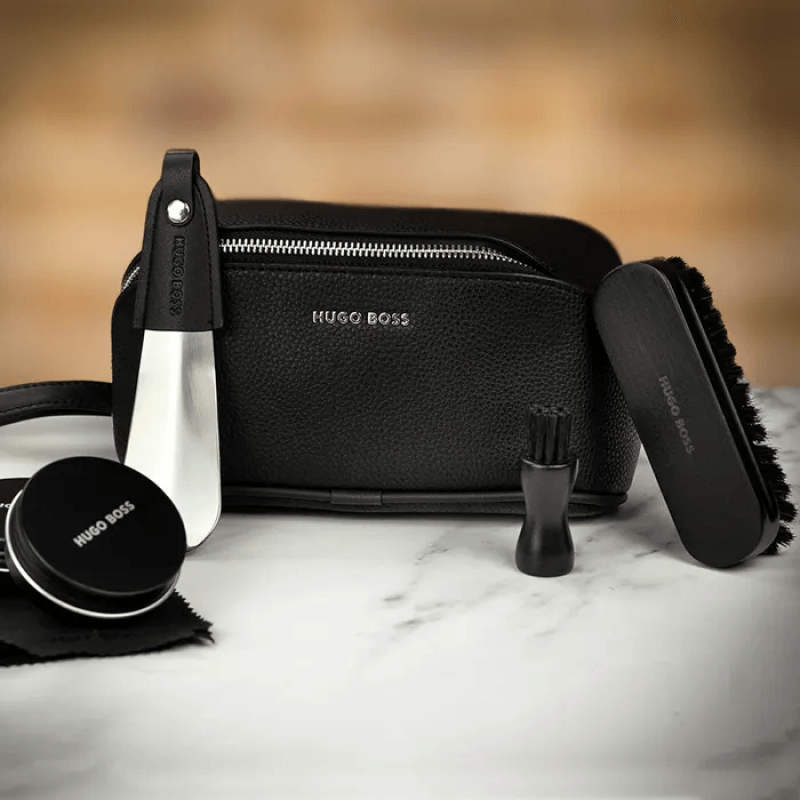 HUGO BOSS Storyline Shoe Care Kit pens set with black and silver pens for shoe maintenance and polishing.