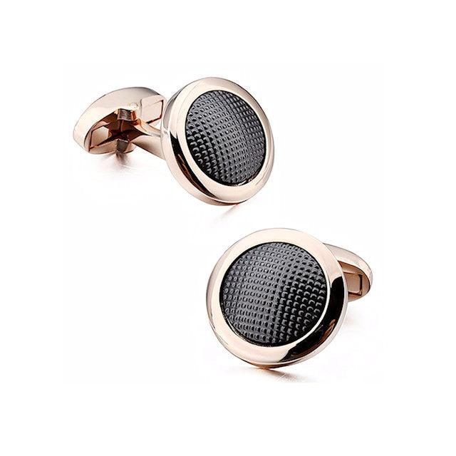 T.M.J gold and gunmetal cufflinks with rose gold round frames and textured black centers