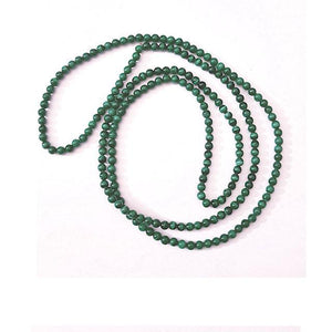 men's green malachite beaded necklace with polished round beads laid out on a white background