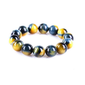 Natural gold and blue tiger eye bead bracelet by T.M.J, featuring round beads on a 17cm stretch bracelet.