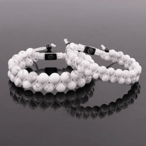 Double macramé Howlite beaded bracelet by T.M.J, featuring white and gray Howlite stones with intricate knotting design.