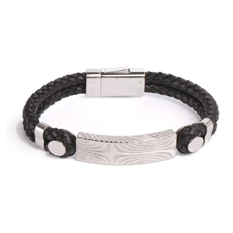 Damascus steel ID bracelet with braided black leather strap, stylish men's accessory from T.M.J.