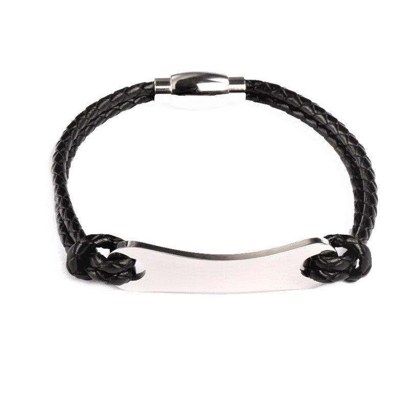 Stainless steel and black leather ID bracelet by T.M.J, featuring a sleek metal plate and durable leather strap.