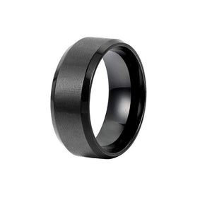 T.M.J Tungsten Carbide Ring called "The Abyss" featuring a sleek, dark finish and smooth band design.