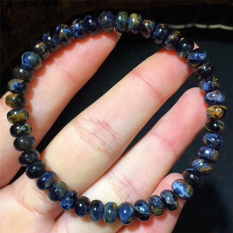 Namibia Natural Pietersite gemstone bead bracelet on elastic strand.