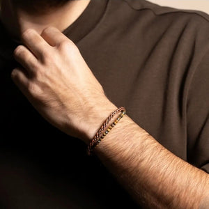 TMJ Marlowe Tiger Eye and braided leather wrap bracelet featuring natural stone beads and handcrafted leather strands.