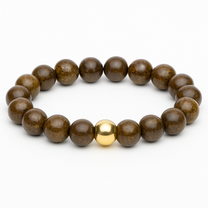 Natural bronzite stone beads bracelet with a golden accent bead.