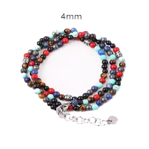 Multi-wrap beaded bracelet with turquoise, red jasper, blue lapis, hematite, and onyx, handcrafted.