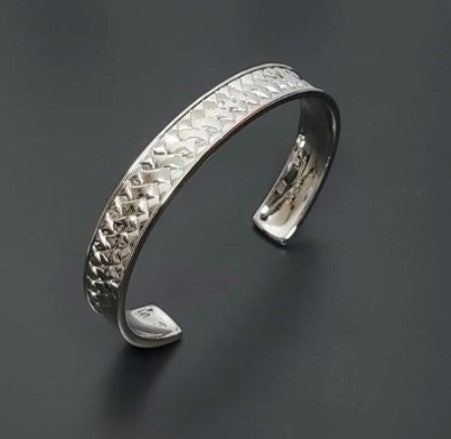 Sterling Silver Woven Pattern Cuff BangleThis bracelet will stand out on its own but will also look great stacked with other bracelets, it bring a glamorous yet sophisticated approach to the mix using this Sterling Silver braceletsT.M.JTheodore Men's JewelrySterling Silver Woven Pattern