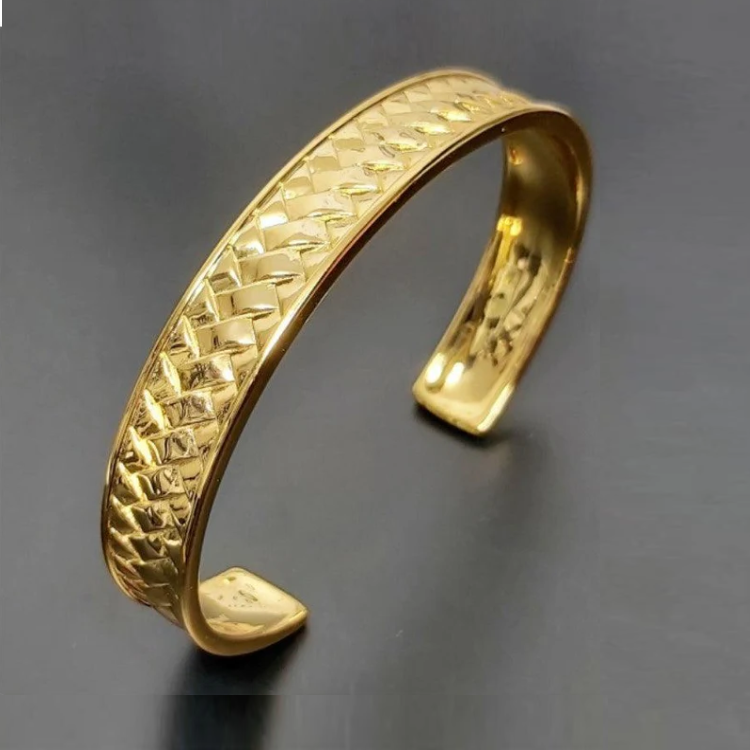 Sterling silver woven pattern cuff bangle with herringbone design in 18K gold plating.