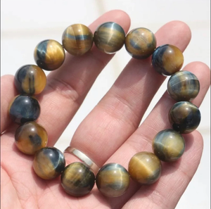 Natural Gold Blue Tiger Eye Bead Bracelet with 14mm beads, handcrafted in Melbourne, elastic design for comfort.