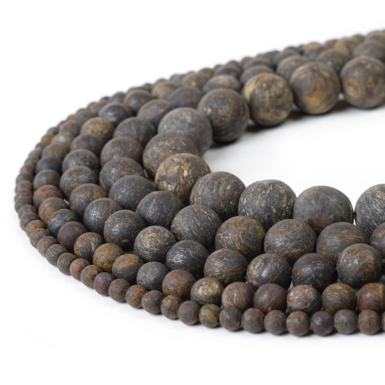 Natural Bronzite stone beaded bracelet with matte finish showcasing earthy tones and varied bead sizes.